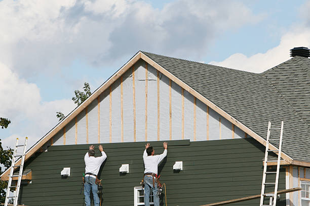 Professional Siding Installation technician working in Highspire, PA